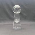 A clear crystal sportsmanship award trophy featuring a transparent baseball on a tapered base with engraved base 