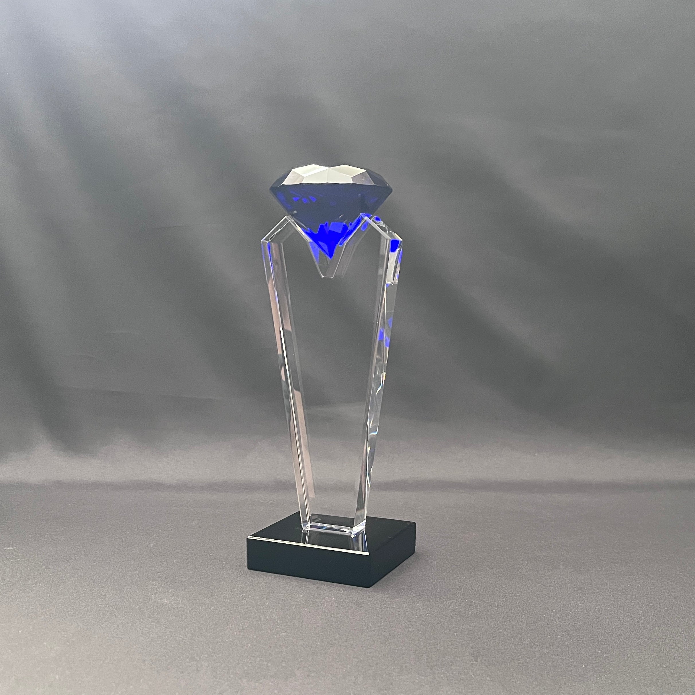 Side view of blue crystal diamond award, sales award 