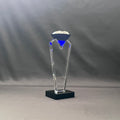 Blue crystal diamond on top of clear crystal base 