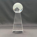 A clear crystal globe trophy on a matching pedestal 