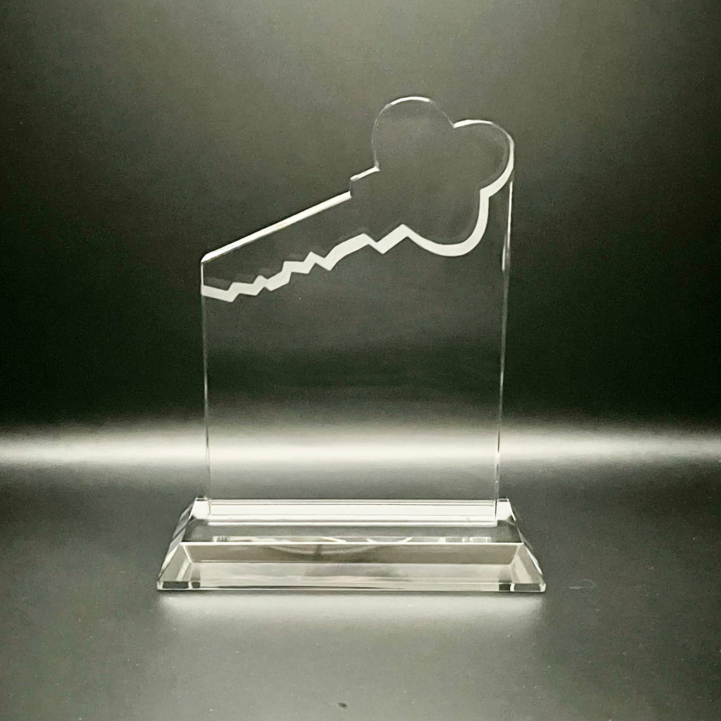 Clear crystal award with key design 