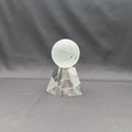 A clear acrylic basketball trophy on a faceted base 
