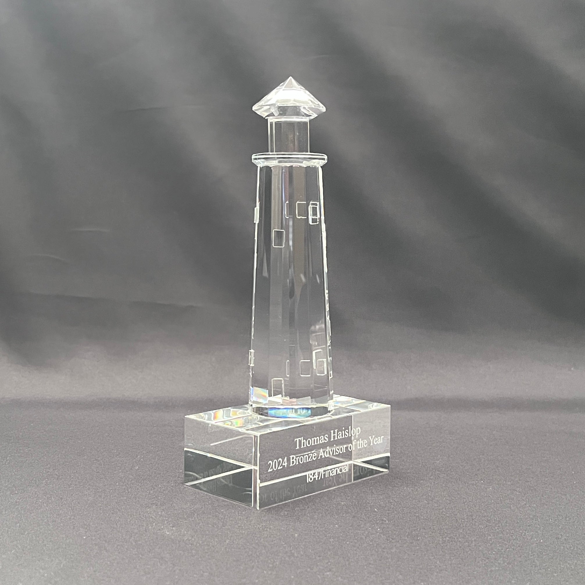 Side view of crystal lighthouse award 